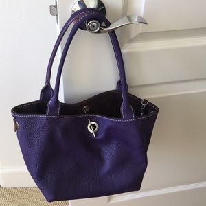 Bag.  Nice purple with brown suede inside. Europe